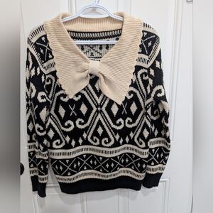 Elegant Black and Cream Cowl Neck Sweater